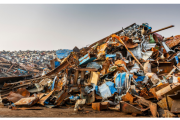 Car scraps in dumpster